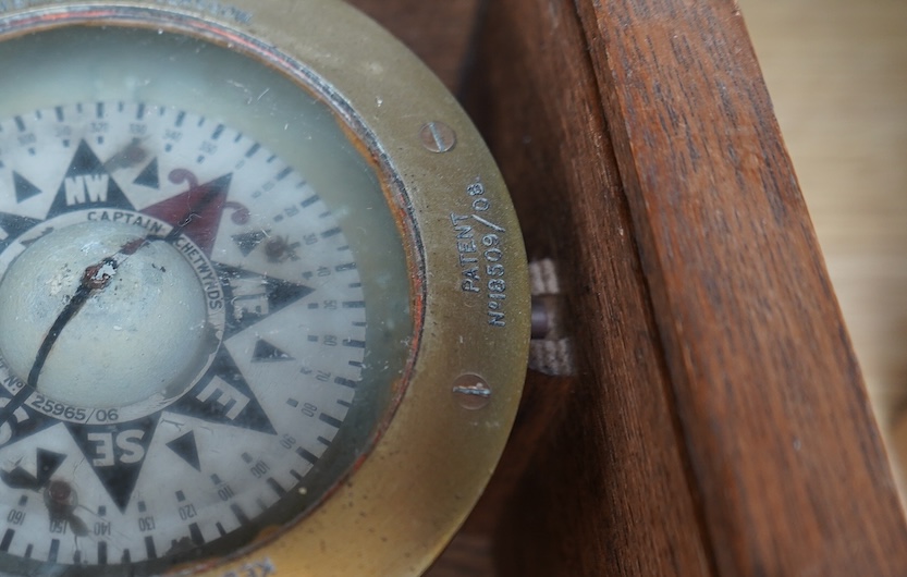 A ‘Kelvin & James White Ltd. 18 Cambridge St. Glasgow’ ship's compass, in a later oak case, 13cm high, 21cm wide, 19cm deep. Condition - poor to fair.